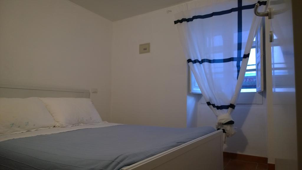 شقة H24 Vacanze Villanova Monteleone الغرفة الصورة